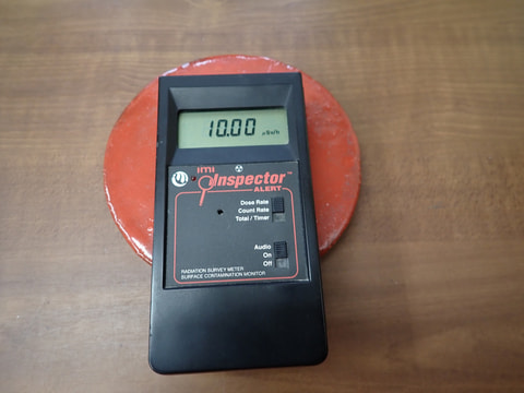 189番　入荷　丸型岩盤北投石粉黛焼付800ｇから1000ｇ位　お風呂　岩盤浴　写真画像