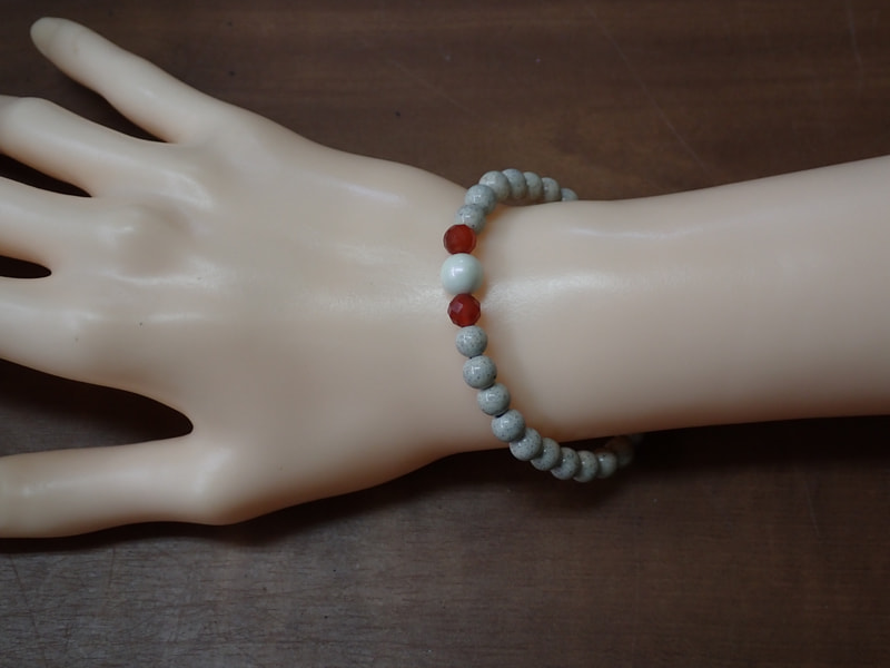 163番　5月7日ご注文分まで当日のお届け　母の日　北投石ブレスレット（赤メノウ）　写真画像