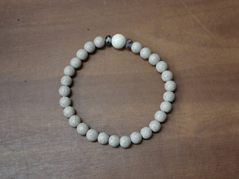 164番　5月7日ご注文分まで当日のお届け母の日　北投石ブレスレット（テラヘルツ）　写真画像