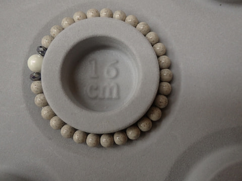 164番　5月7日ご注文分まで当日のお届け母の日　北投石ブレスレット（テラヘルツ）　写真画像