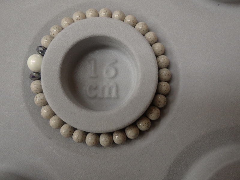 164番　5月7日ご注文分まで当日のお届け母の日　北投石ブレスレット（テラヘルツ）　写真画像