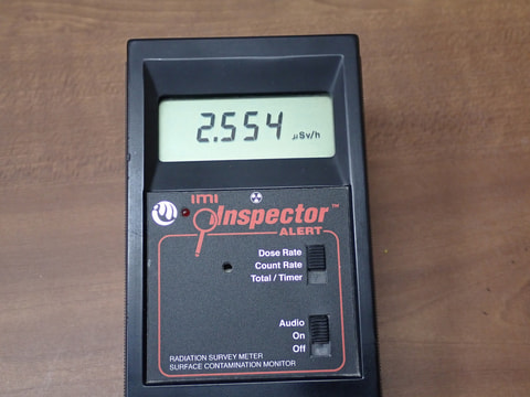 210番　８ｍｍブレスレット（玉川産北投石天然色10ｍｍ、台湾産北投石、ボタン）　写真画像