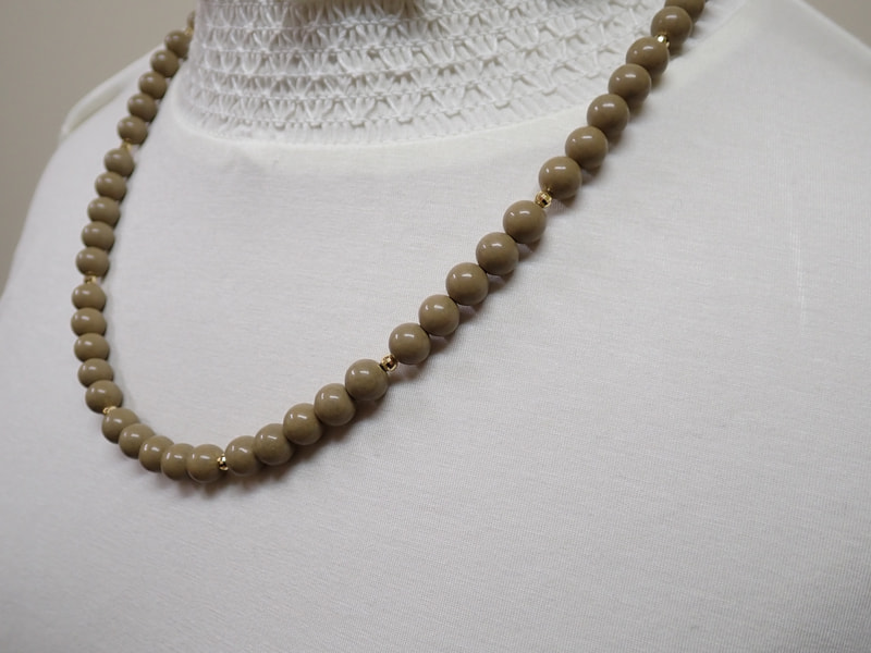 オリジナルネックレス北投石18金ミラーボール入り　写真画像